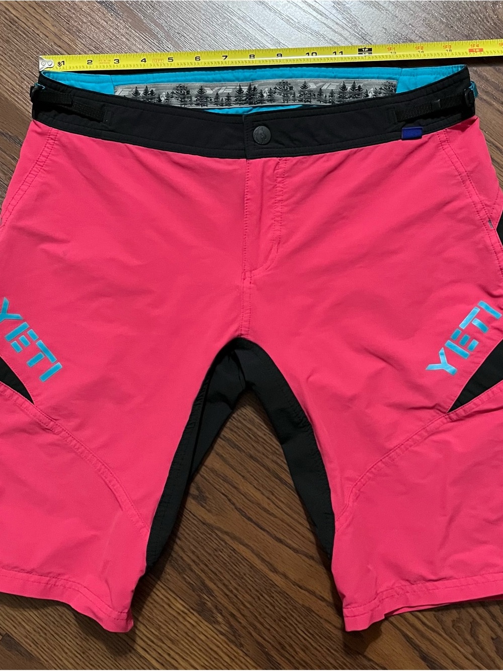 Yeti Coral Pink and Black Mountain Bike Shorts with Blue Logos